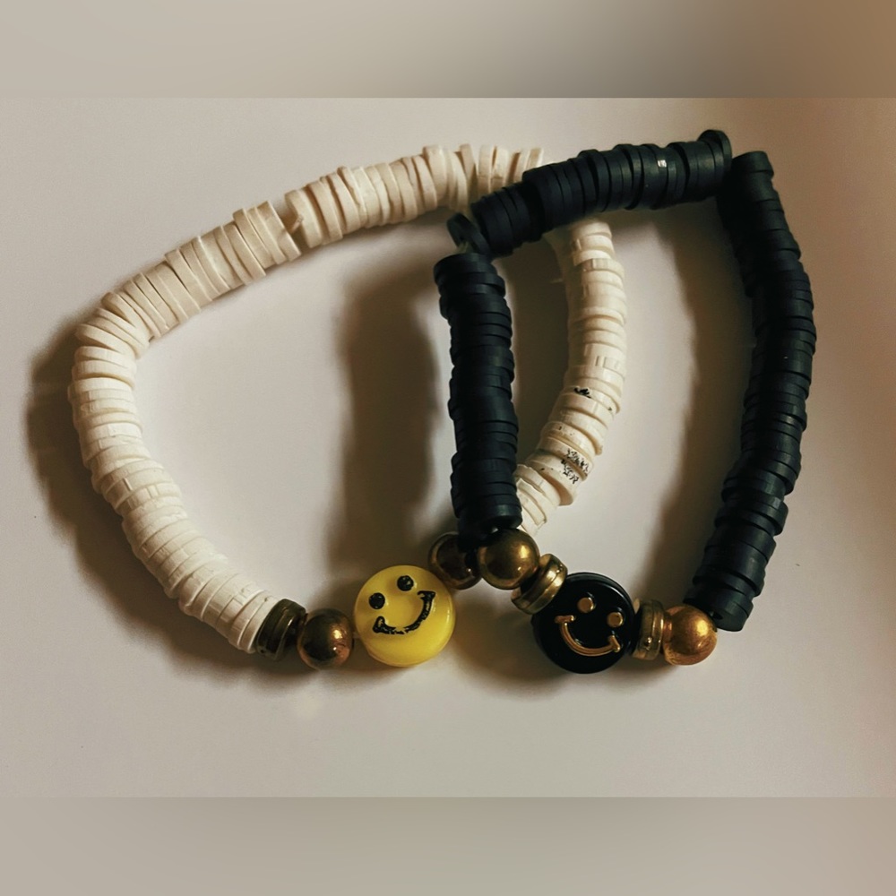 two pack handmade clay bead friendship bracelets black & white.